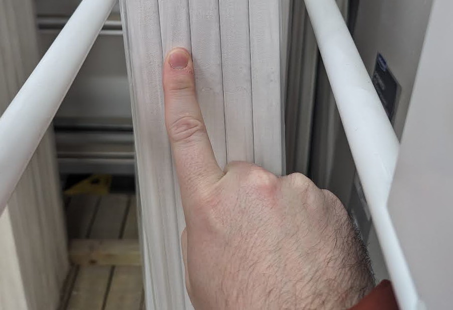 Me sizing up the wood by, er, measuring it with my index finger.