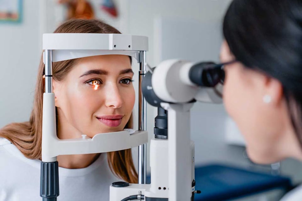 Imagine being tested like this and seeing your kid sitting behind the optometrist, opening a cupboard and picking up bits of medical equipment