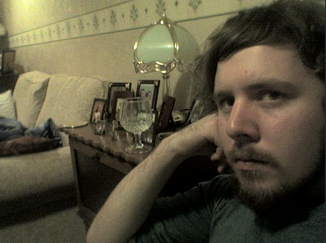 Your humble author, 2007, at his nan’s house waiting for a taxi to the airport.